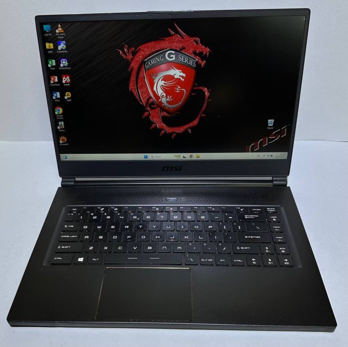 Ігровий ноутбук Б-клас MSI GS65 Stealth Thin 8RF / 15.6" (1920x1080) IPS / Intel Core i7-8750H (6 (12) ядер по 2.2 - 4.1 GHz) / 32 GB DDR4 / 512 GB SSD / nVidia GeForce GTX 1070 Max-Q, 8 GB GDDR5, 256-bit / WebCam / Win 11 Pro б/в - зображення 2