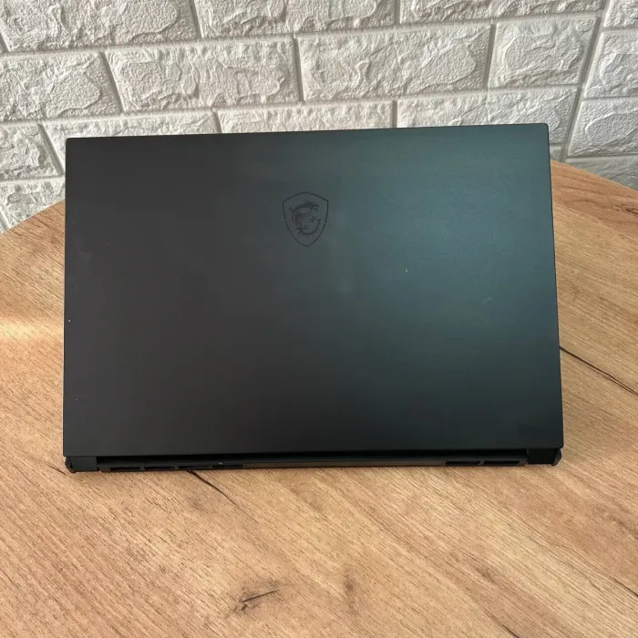 Ігровий ноутбук MSI GS66 Stealth 10SE / 15.6" (1920x1080) IPS / Intel Core i7-10750H (6 (12) ядер по 2.6 - 5.0 GHz) / 16 GB DDR4 / 512 GB SSD / nVidia GeForce RTX 2060, 6 GB GDDR6, 192-bit / WebCam б/в - зображення 3