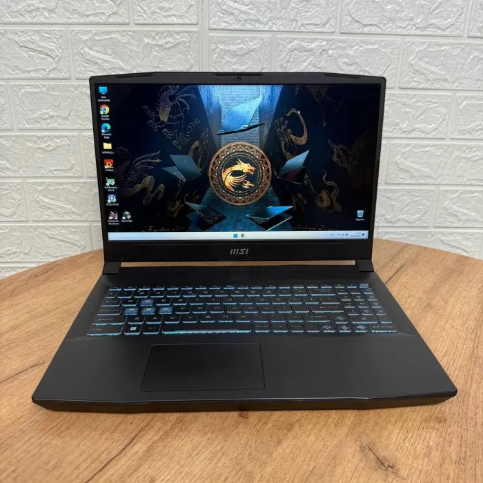 Ігровий ноутбук Б-клас MSI Bravo 15 B7ED / 15.6" (1920x1080) IPS / AMD Ryzen 7 7735HS (8 (16) ядер по 3.2 - 4.75 GHz) / 16 GB DDR4 / 512 GB SSD / AMD Radeon RX 6550M, 4 GB GDDR6, 64-bit / WebCam б/в - зображення 2