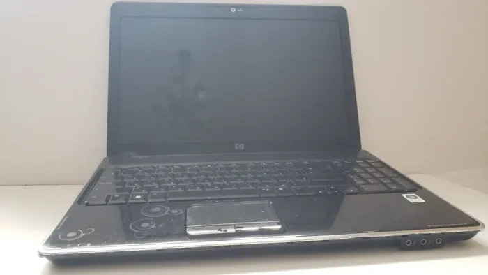 Ноутбук Б-клас HP Pavilion dv6-1120er / 15.6" (1366x768) TN / AMD Turion X2 RM-75 (2 ядра по 2.2 GHz) / 4 GB DDR2 / 180 GB SSD / AMD Radeon HD 4530, 512 MB GDDR3, 64-bit / WebCam / DVD-ROM / АКБ не держит б/в - зображення 2