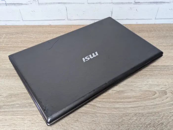 Ноутбук Б-клас MSI CR61 / 15.6" (1366x768) TN / Intel Core i5-3230M (2 (4) ядра по 2.6 - 3.2 GHz) / 8 GB DDR3 / 128 GB SSD / Intel HD Graphics 4000 / WebCam / DVD-ROM б/в - зображення 8