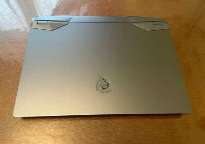 Ігровий ноутбук Б-клас MSI GE66 Raider 11UH-202US / 15.6" (2560x1440) IPS / Intel Core i9-11980HK (8 (16 ядер по 3.3 - 5.0 GHz) / 32 GB DDR4 / 1000 GB SSD / nVidia GeForce RTX 3080, 16 GB GDDR6, 256-bit / WebCam б/в - зображення 3