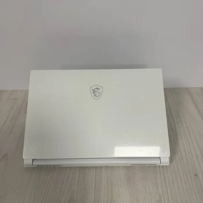 Ігровий ноутбук MSI Stealth 15M A11UEK White / 15.6" (1920x1080) IPS / Intel Core i7-11375H (4 (8) ядра по 3.0 - 5.0 GHz) / 32 GB DDR4 / 1000 GB SSD NVMe / nVidia GeForce RTX 3060, 6 GB GDDR6, 192-bit / WebCam б/в - зображення 3