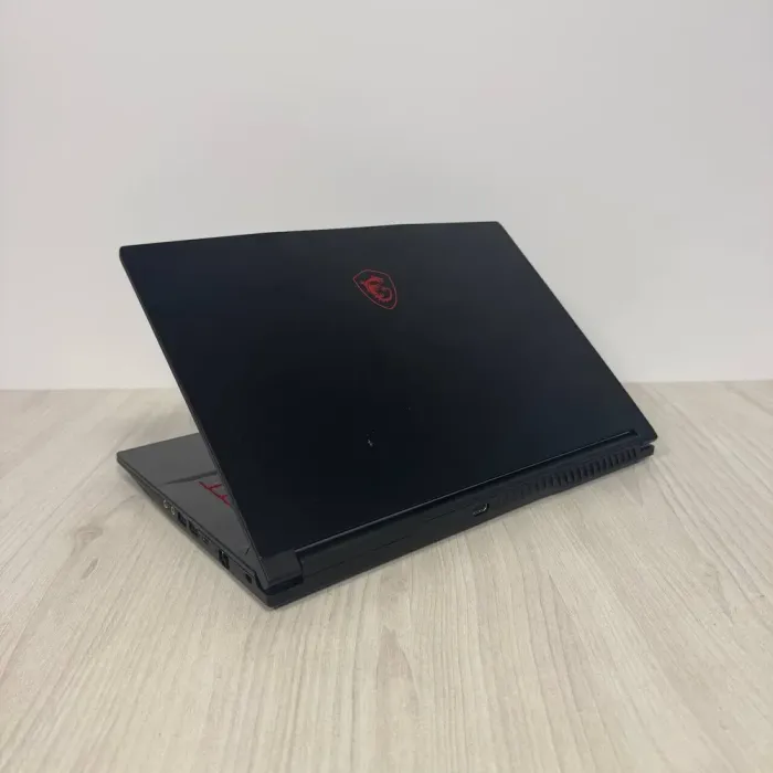Ігровий ноутбук Б-класу MSI GF63 Thin 11UC / 15.6" (1920x1080) IPS / Intel Core i5-11400H (6 (12) ядер по 2,7 - 4,5 ГГц) / 8 ГБ DDR4 / 512 ГБ SSD NVMe / nVidia GeForce RTX 3050, 4 ГБ GDDR6, 128-bit / WebCam б/в - зображення 6