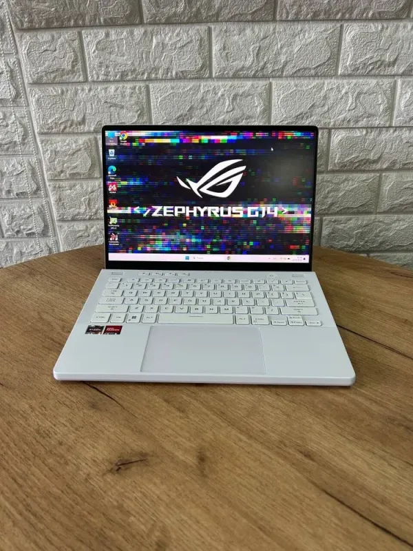 Ігровий ноутбук Asus ROG Zephyrus G14 GA402RJ / 14" (2560x1600) IPS / AMD Ryzen 9 6900HS (8 (16) ядер по 3.3 - 4.9 GHz) / 16 GB DDR4 / 1000 GB SSD / AMD Radeon RX 6700S, 8 GB GDDR6, 128-bit / WebCam б/в - зображення 2