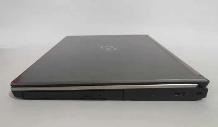 Мобільна робоча станція Fujitsu Celsius H730 / 15.6" (1920x1080) IPS / Intel Core i7-4810MQ (4 (8) ядра по 2.8 - 3.8 GHz) / 16 GB DDR3 / 256 GB SSD / nVidia Quadro K2100M, 2 GB GDDR5, 128-bit / WebCam / DVD-ROM б/в - зображення 5