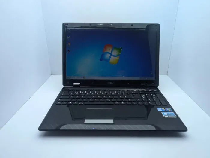 Ноутбук MSI CX63 / 15.6" (1366x768) TN / Intel Core i5-460M (2 (4) ядра по 2.53 - 2.8GHz) / 6 GB DDR3 / 500 GB HDD / nVidia GeForce 310M, 1 GB GDDR3, 64-bit / WebCam б/в - зображення 7