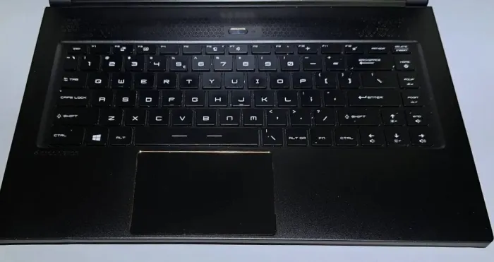 Ігровий ноутбук Б-клас MSI GS65 Stealth Thin 8RF / 15.6" (1920x1080) IPS / Intel Core i7-8750H (6 (12) ядер по 2.2 - 4.1 GHz) / 32 GB DDR4 / 512 GB SSD / nVidia GeForce GTX 1070 Max-Q, 8 GB GDDR5, 256-bit / WebCam / Win 11 Pro б/в - зображення 8