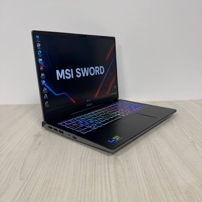 Ігровий ноутбук Б-клас MSI Sword 16 HX B13VGKG / 16" (2560x1600) IPS / Intel Core i7-13700HX (16 (24) ядер по 2.1 - 5.0 GHz) / 32 GB DDR5 / 1000 GB SSD NVMe / nVidia GeForce RTX 4070, 8 GB GDDR6, 128-bit б/в - зображення 4