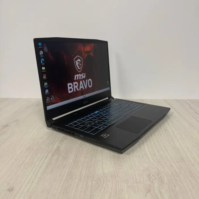 Ігровий ноутбук Б-класу MSI Bravo 15 C7VE / 15,6" (1920x1080) IPS / AMD Ryzen 5 7535HS (6 (12) ядер по 3,3 - 4,55 ГГц) / 16 ГБ DDR5 / 512 ГБ SSD / nVidia GeForce RTX 4050, 6 ГБ GDDR6, 96-біт / WebCam б/в - изображение 4