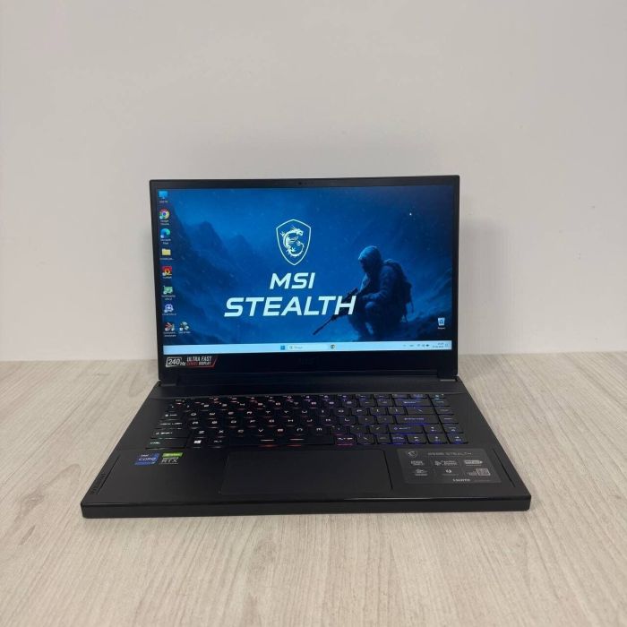 Ігровий ноутбук MSI GS66 Stealth 11UH / 15.6" (1920x1080) IPS / Intel Core i9-11900H (8 (16) ядер по 2,5 - 4,9 ГГц) / 16 ГБ DDR4 / 512 ГБ SSD / nVidia GeForce RTX 3080, 16 ГБ GDDR6, 256-біт / WebCam б/в - изображение 2