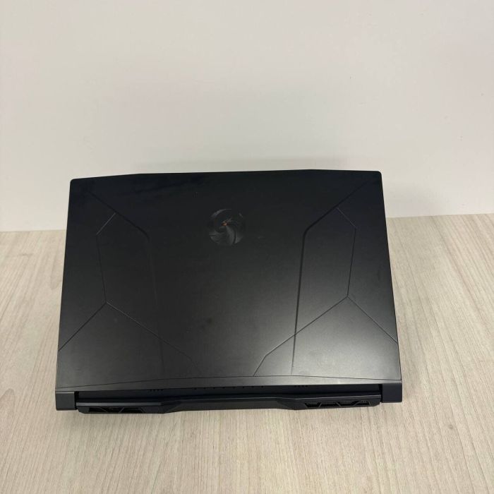 Ігровий ноутбук Б-класу MSI Bravo 15 C7VFK / 15.6" (1920x1080) IPS / AMD Ryzen 7 7735HS (8 (16) ядер по 3.2 - 4.75 GHz) / 16 GB DDR5 / 512 GB SSD NVMe / nVidia GeForce RTX 4060, 8 GB GDDR6, 128-bit / WebCam б/в - изображение 9