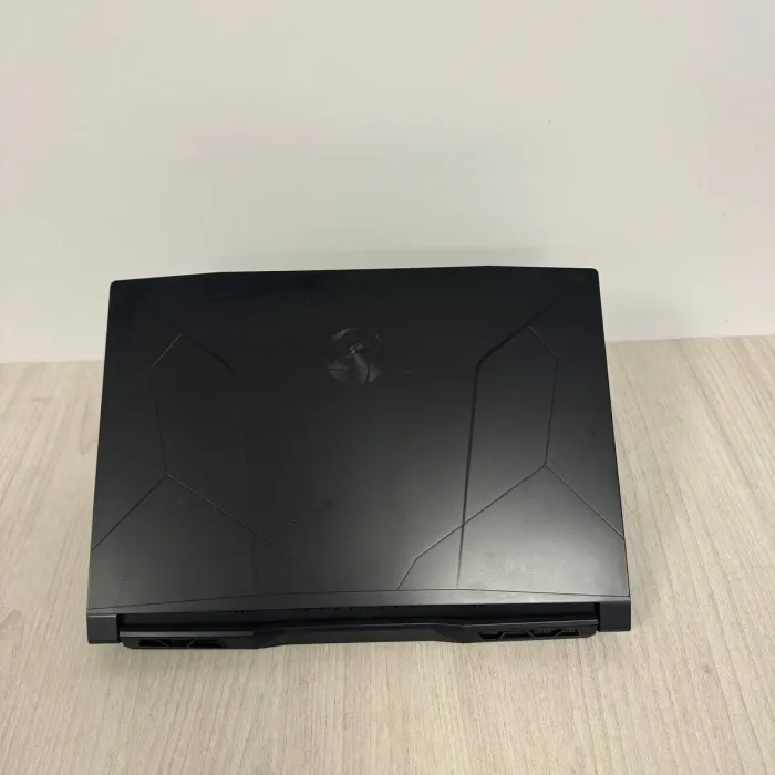 Ігровий ноутбук Б-класу MSI Bravo 15 C7VFK / 15.6" (1920x1080) IPS / AMD Ryzen 7 7735HS (8 (16) ядер по 3.2 - 4.75 GHz) / 16 GB DDR5 / 512 GB SSD NVMe / nVidia GeForce RTX 4060, 8 GB GDDR6, 128-bit / WebCam б/в - зображення 9