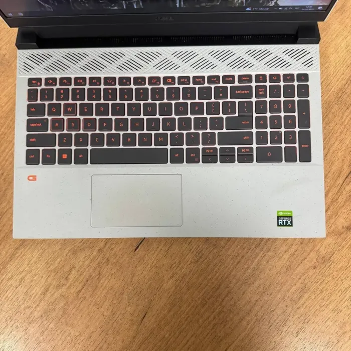 Ігровий ноутбук Dell G15 5525 / 15.6" (1920x1080) IPS / AMD Ryzen 7 6800H (8 (16) ядер по 3.2 - 4.7 GHz) / 16 GB DDR5 / 512 GB SSD / nVidia GeForce RTX 3050, 4 GB GDDR6, 128-bit / WebCam б/в - зображення 7