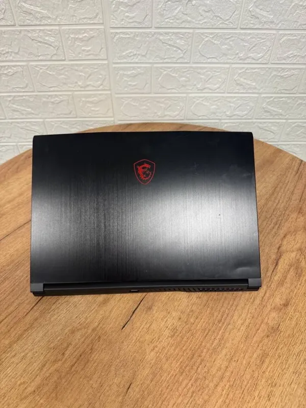 Ігровий ноутбук Б-клас MSI GV15 Thin 11SCV / 15.6" (1920x1080) IPS / Intel Core i5-11400H (6 (12) ядер по 2.7 - 4.5 GHz) / 8 GB DDR4 / 256 GB SSD / nVidia GeForce GTX 1650 Max-Q, 4 GB GDDR6, 128-bit / WebCam б/в - зображення 3