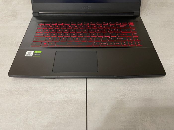 Ігровий ноутбук MSI Thin 15 GF63 10SC-035US / 15,6" (1920x1080) IPS / Intel Core i5-10300H (4 (8) ядра по 2,5 - 4,5 ГГц) / 16 ГБ DDR4 / 256 ГБ SSD M.2 + 500 ГБ HDD / nVidia GeForce GTX 1650 Max-Q, 4 ГБ GDDR5, 128-біт / WebCam б/в - зображення 4