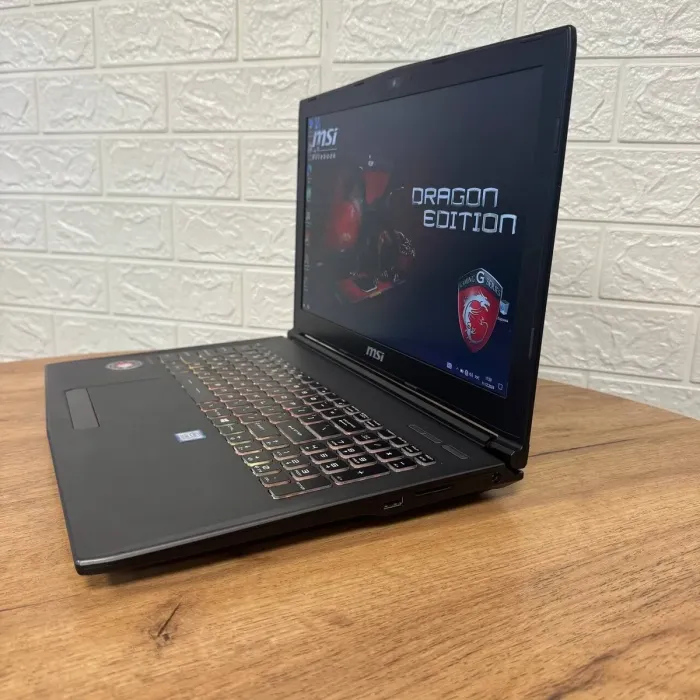 Ігровий ноутбук Б-клас MSI GF62VR 7RF Apache Pro / 15.6" (3840x2160) IPS / Intel Core i7-7700HQ (4 (8) ядра по 2.8 - 3.8 GHz) / 16 GB DDR4 / 128 GB SSD + 1000 GB HDD / nVidia GeForce GTX 1060, 6 GB GDDR5, 192-bit / WebCam б/в - зображення 5