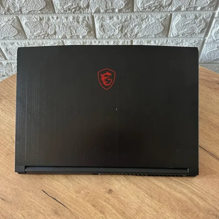 Ігровий ноутбук Б-клас MSI GF63 Thin 11UC / 15.6" (1920x1080) IPS / Intel Core i5-11400H (6 (12) ядер по 2.7 - 4.5 GHz) / 16 GB DDR4 / 512 GB SSD / nVidia GeForce RTX 3050, 4 GB GDDR6, 128-bit / WebCam б/в - зображення 3