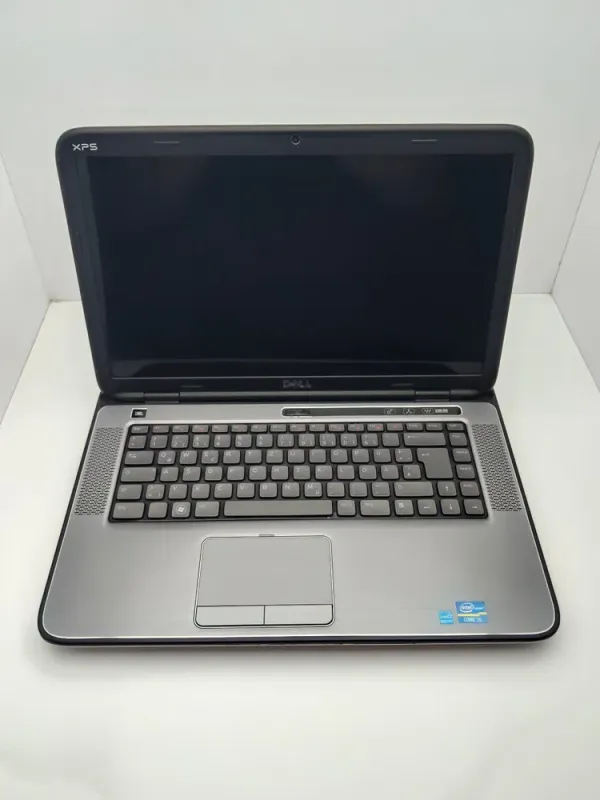 Ноутбук Dell XPS L502X / 15.6" (1366x768) TN / Intel Core i5-2410M (2 (4) ядра по 2.3 - 2.9 GHz) / 6 GB DDR3 / 1000 GB HDD / nVidia GeForce GT 525M, 1 GB DDR3, 128-bit / WebCam / Акб не тримає б/в - зображення 2