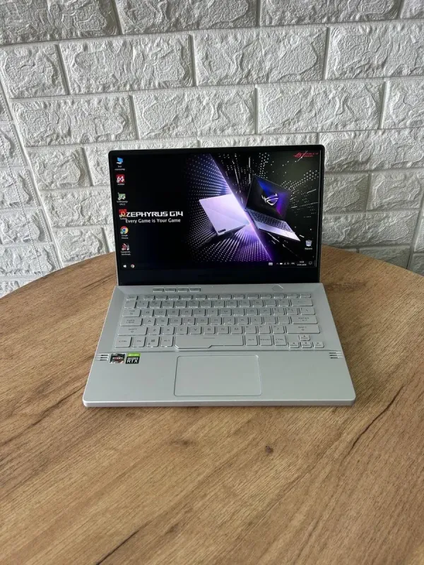 Ігровий ультрабук Б-клас Asus ROG Zephyrus G14 GA401QM / 14" (1920x1080) IPS / AMD Ryzen 9 5900HS (8 (16) ядер по 3.0 - 4.6 GHz) / 16 GB DDR4 / 1000 GB SSD / nVidia GeForce RTX 3060, 6 GB GDDR6, 192-bit б/в - зображення 2