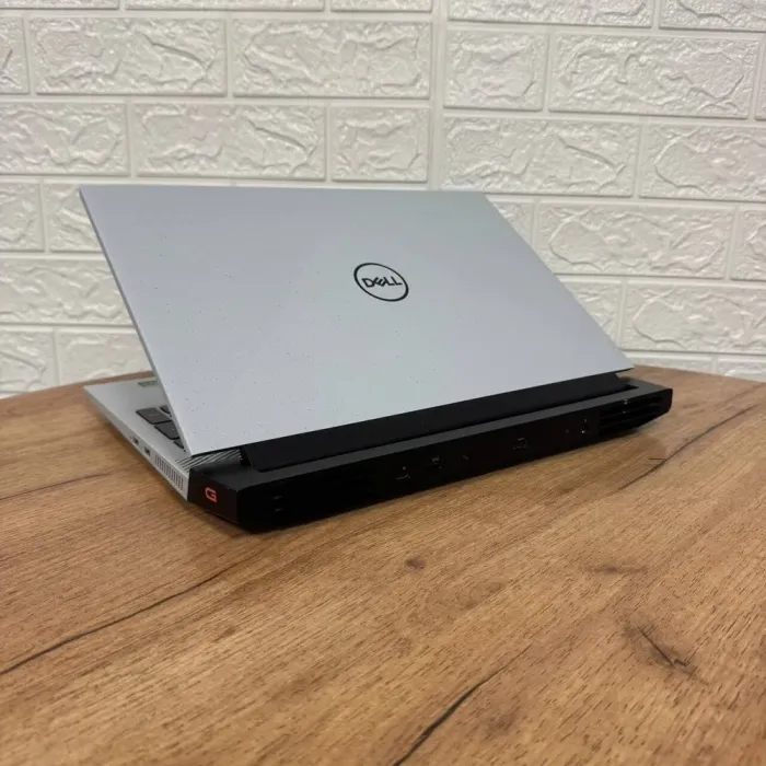 Ігровий ноутбук Dell G15 5525 / 15.6" (1920x1080) IPS / AMD Ryzen 7 6800H (8 (16) ядер по 3.2 - 4.7 GHz) / 16 GB DDR5 / 512 GB SSD / nVidia GeForce RTX 3050, 4 GB GDDR6, 128-bit / WebCam б/в - зображення 6