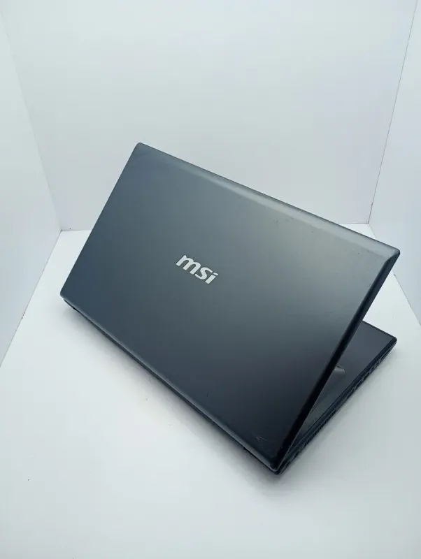 Ноутбук MSI CR70 / 17.3" (1600x900) TN / Intel Core i5-4310M (2 (4) ядра по 2.7 - 3.4 GHz) / 8 GB DDR3 / 1000 GB HDD / Intel HD Graphics 4600 / WebCam б/в - зображення 8