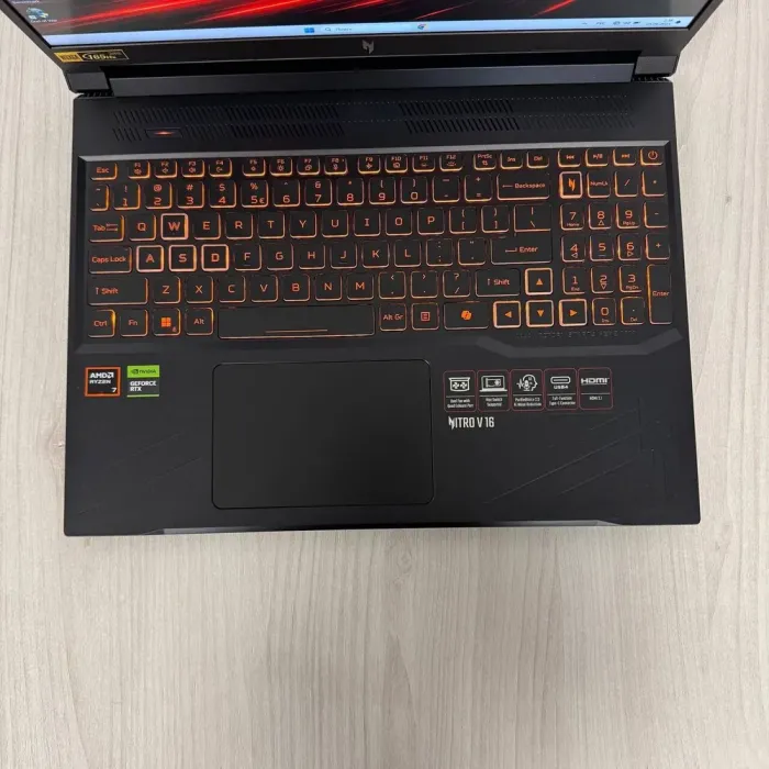 Ігровий ноутбук Acer Nitro V16 ANV16-41-R514 / 16" (1920x1200) IPS / AMD Ryzen 7 8845HS (8 (16) ядер по 3.8 - 5.1 GHz) / 16 GB DDR5 / 1000 GB SSD NVMe / nVidia GeForce RTX 4060, 8 GB GDDR6, 128-bit / WebCam б/в - зображення 7