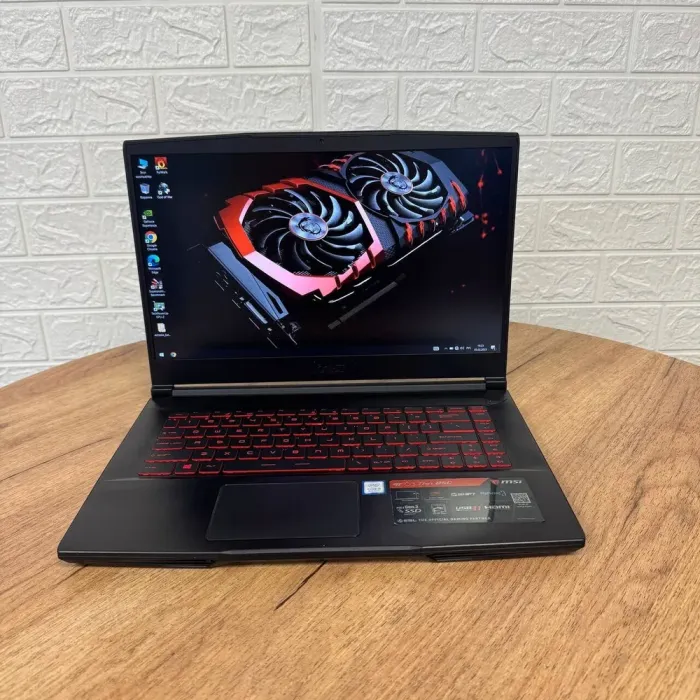 Ігровий ноутбук Б-клас MSI GF63 Thin 8SC / 15.6" (1920x1080) IPS / Intel Core i5-8300H (4 (8) ядра по 2.3 - 4.0 GHz) / 8 GB DDR4 / 256 GB SSD / nVidia GeForce GTX 1650 Max-Q, 4 GB GDDR6, 128-bit / WebCam б/в - зображення 2