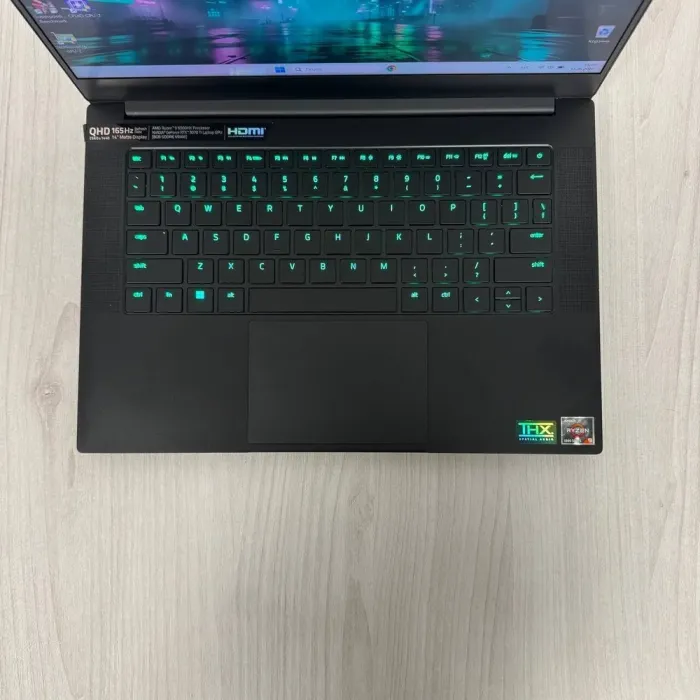 Ігровий ноутбук Razer Blade 14 RZ09-0427 / 14" (2560x1440) IPS / AMD Ryzen 9 6900HX (8 (16) ядер по 3.3 - 4.9 GHz) / 16 GB DDR5 / 1000 GB SSD NVMe / nVidia GeForce RTX 3070 Ti, 8 GB GDDR6, 256-bit / WebCam б/в - зображення 7