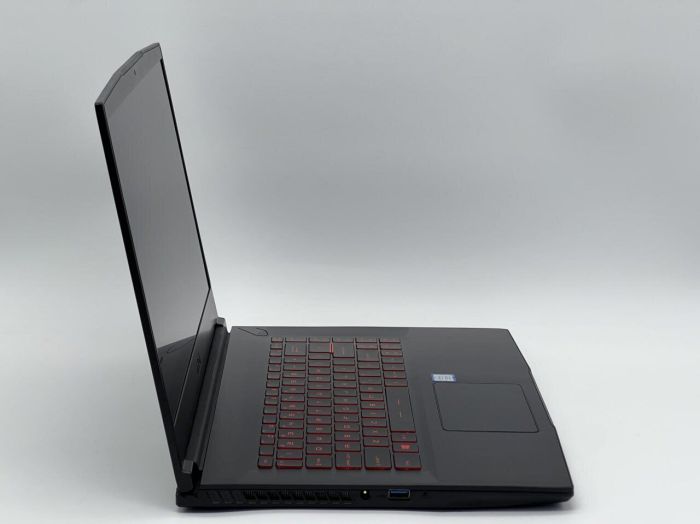 Ігровий ноутбук MSI GF63 8RD / 15.6" (1920x1080) IPS / Intel Core i7-8750H (6 (12) ядер по 2.2 - 4.1 GHz) / 16 GB DDR4 / 480 GB SSD / nVidia GeForce GTX 1050 Ti, 4 GB GDDR5, 128-bit / WebCam б/в - зображення 3