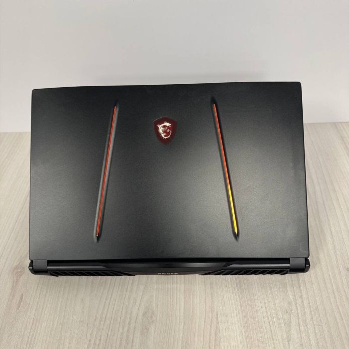 Ігровий ноутбук Б-клас MSI GE75 Raider 10SF / 17.3" (1920x1080) IPS / Intel Core i7-10750H (6 (12) ядер по 2.6 - 5.0 GHz) / 16 GB DDR4 / 512 GB SSD NVMe + 1000 GB HDD / nVidia GeForce RTX 2070, 8 GB GDDR6, 256-bit / WebCam б/в - зображення 3