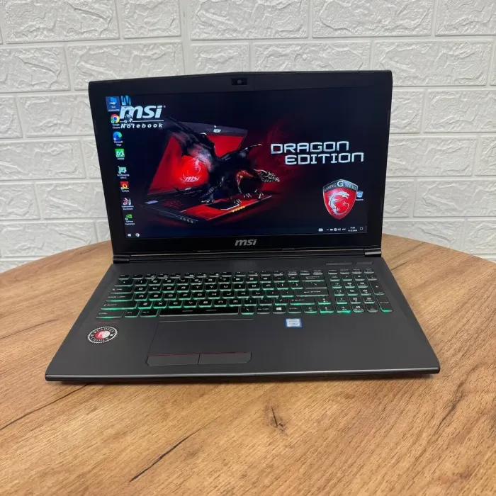 Ігровий ноутбук Б-клас MSI GF62VR 7RF Apache Pro / 15.6" (3840x2160) IPS / Intel Core i7-7700HQ (4 (8) ядра по 2.8 - 3.8 GHz) / 16 GB DDR4 / 128 GB SSD + 1000 GB HDD / nVidia GeForce GTX 1060, 6 GB GDDR5, 192-bit / WebCam б/в - зображення 2