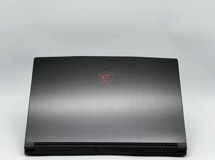 Ігровий ноутбук Б-класу MSI GF63 Thin 11SC MS-16R6 / 15.6" (1920x1080) IPS / Intel Core i5-11400H (6 (12) ядер по 2,7 - 4,5 ГГц) / 16 ГБ DDR4 / 960 ГБ SSD / nVidia GeForce GTX 1650 Max-Q, 4 ГБ GDDR6, 128-біт / WebCam б/в - зображення 5