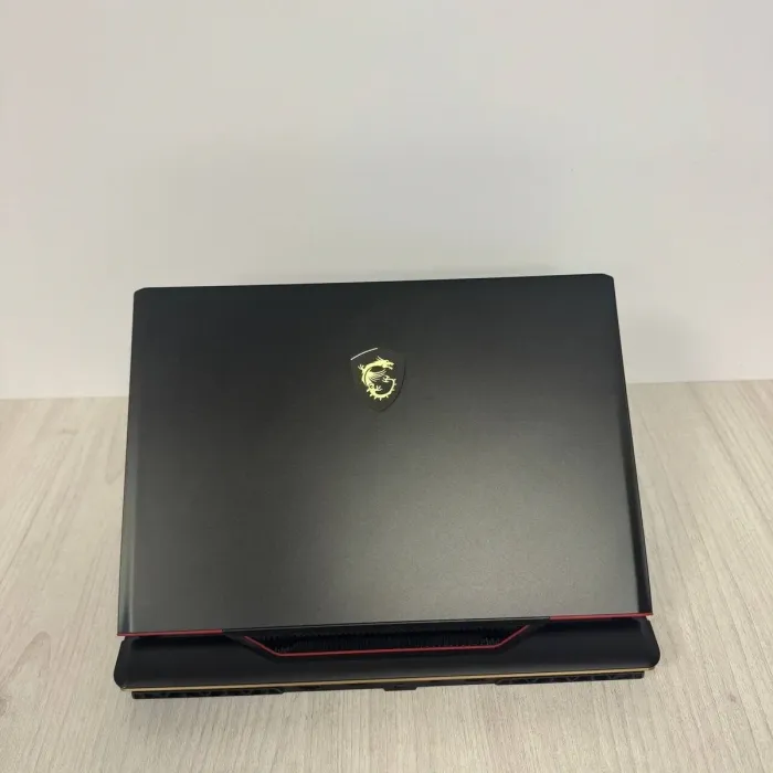 Ігровий ноутбук Б-класу MSI Raider GE68 HX 14VGG / 16" (1920×1200) IPS / Intel Core i9-14900HX (24 (32) ядра по 2,2 - 5,7 ГГц) / 32 ГБ DDR5 / 1000 ГБ SSD NVMe / nVidia GeForce RTX 4070, 8 ГБ GDDR6, 128-біт / Веб-камера б/в - зображення 9