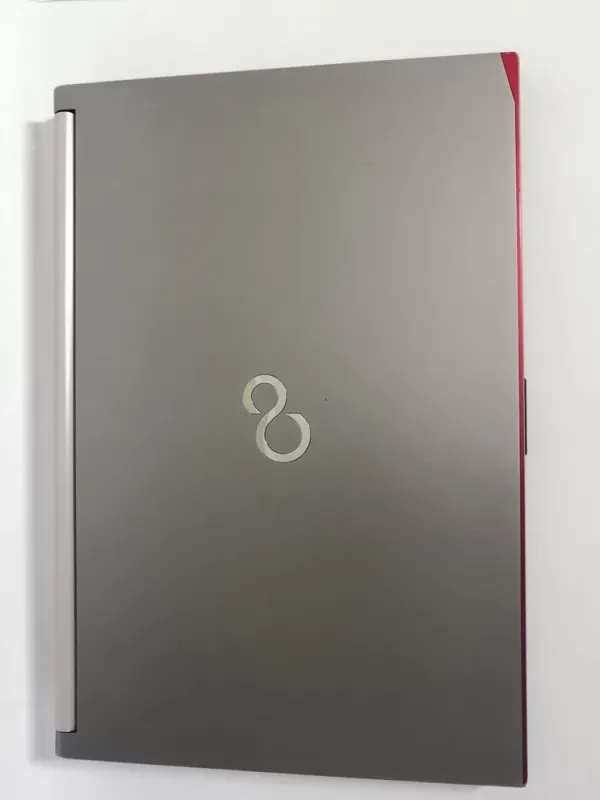 Мобільна робоча станція Fujitsu Celsius H730 / 15.6" (1920x1080) IPS / Intel Core i7-4810MQ (4 (8) ядра по 2.8 - 3.8 GHz) / 16 GB DDR3 / 256 GB SSD / nVidia Quadro K2100M, 2 GB GDDR5, 128-bit / WebCam / DVD-ROM б/в - зображення 7