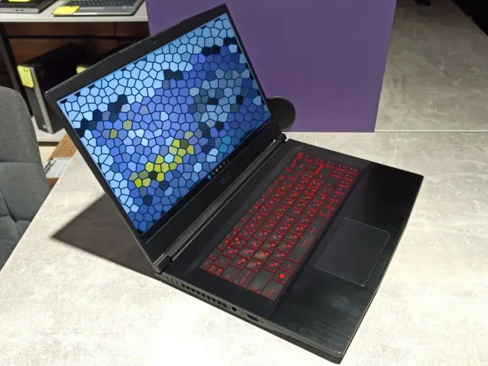 Ігровий ноутбук MSI GF65 Thin 10UE-083NE / 15.6" (1920x1080) IPS / Intel Core i5-10200H (6 (12) ядер по 2.5 - 4.5 GHz) / 32 GB DDR4 / 960 GB SSD / nVidia GeForce RTX 3060, 6 GB GDDR6, 192-bit / WebCam б/в - зображення 4