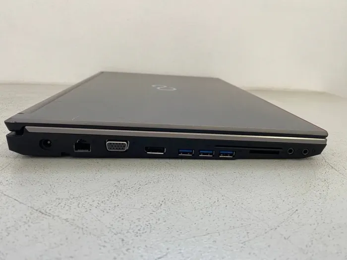 Мобільна робоча станція Fujitsu Celsius H730 / 15.6" (1920x1080) IPS / Intel Core i7-4810MQ (4 (8) ядра по 2.8 - 3.8 GHz) / 16 GB DDR3 / 256 GB SSD / nVidia Quadro K1100M, 2 GB GDDR5, 128-bit / WebCam / DVD-ROM б/в - зображення 3