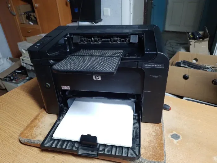 Принтер HP LaserJet Pro P1606dn / лазерний монохромний друк / 600x600 dpi / A4 / 25 стор / хв / USB 2.0, Ethernet / Двосторонній друк Дуплекс б/в - зображення 2