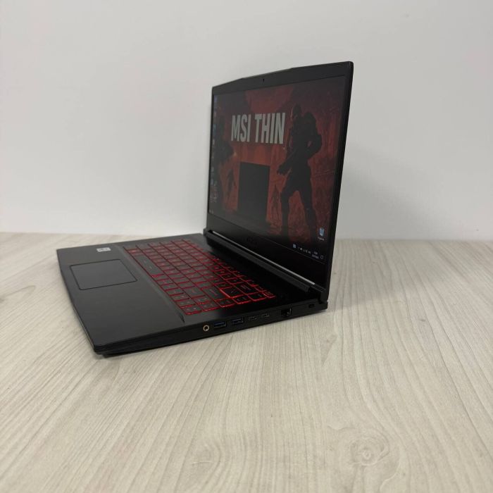 Ігровий ноутбук Б-клас MSI GF65 Thin 10SER / 15.6" (1920x1080) IPS / Intel Core i7-10750H (6 (12) ядер по 2.6 - 5.0 GHz) / 16 GB DDR4 / 512 GB SSD NVMe / nVidia GeForce RTX 2060, 6 GB GDDR6, 192-bit / WebCam б/в - зображення 5