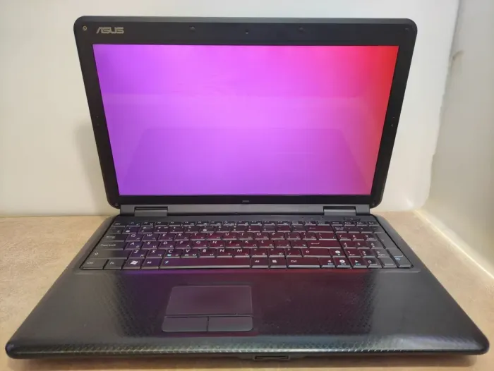 Ноутбук Asus K50C / 15.6" (1366x768) TN / Intel Celeron 220 (1 ядро по 1.2 GHz) / 4 GB DDR2 / 120 GB SSD / SIS Mirage 3 Graphics / WebCam / АКБ не тримає б/в - зображення 2
