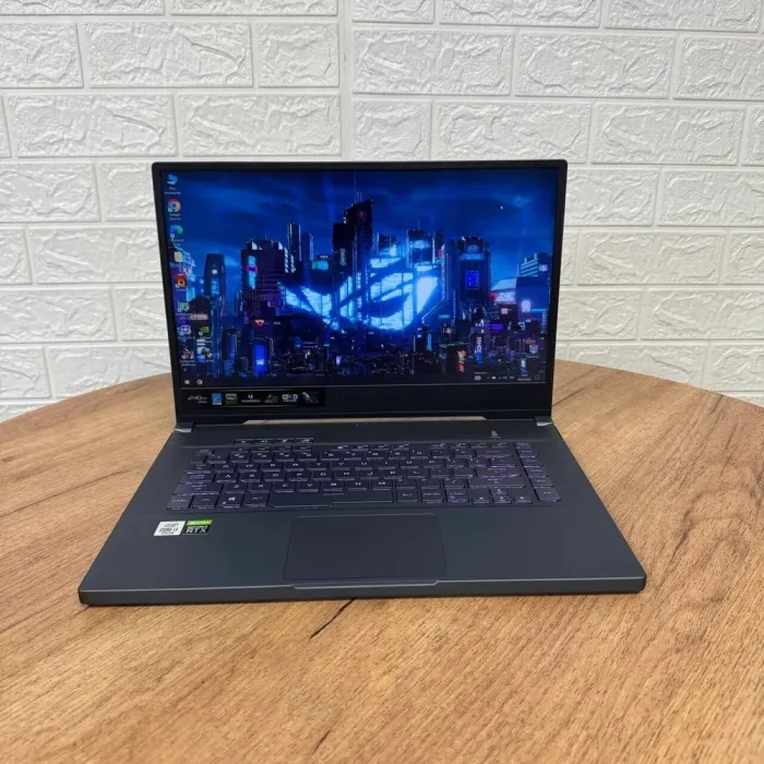 Ігровий ноутбук Б-клас Asus ROG Zephyrus GU502LW / 15.6" (1920x1080) IPS / Intel Core i7-10750H (6 (12) ядер по 2.6 - 5.0 GHz) / 16 GB DDR4 / 1000 GB SSD / nVidia GeForce RTX 2070 Max-Q, 8 GB GDDR6, 256-bit / WebCam б/в - зображення 2