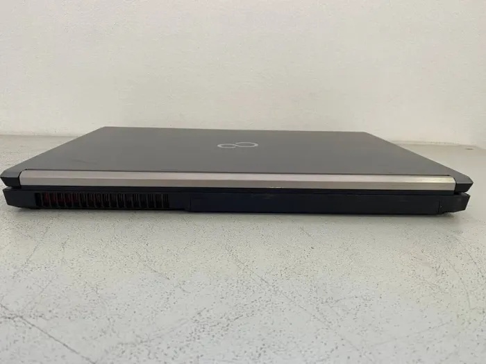 Мобільна робоча станція Fujitsu Celsius H730 / 15.6" (1920x1080) IPS / Intel Core i7-4800MQ (4 (8) ядра по 2.7 - 3.7 GHz) / 32 GB DDR3 / 256 GB SSD / nVidia Quadro K1100M, 2 GB GDDR5, 128-bit / WebCam / DVD-ROM б/в - зображення 5