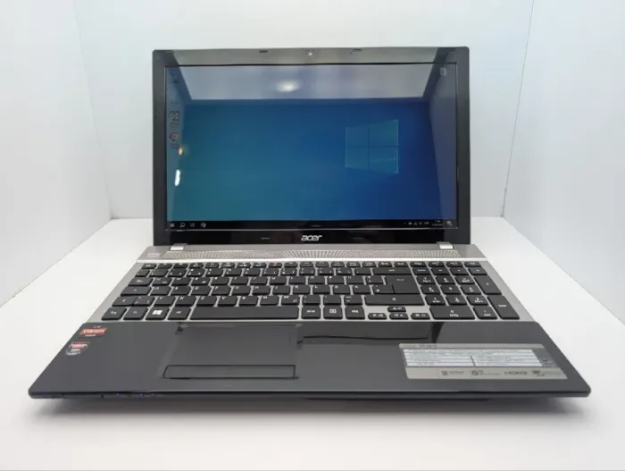 Ноутбук Acer Aspire V3-551G / 15.6" (1366x768) TN / AMD A10-4600M (4 ядра по 2.3 - 3.2 GHz) / 8 GB DDR3 / 1000 GB HDD / AMD Radeon HD 7670M, 2 GB GDDR3, 128-bit / WebCam / DVD-ROM б/в - зображення 2