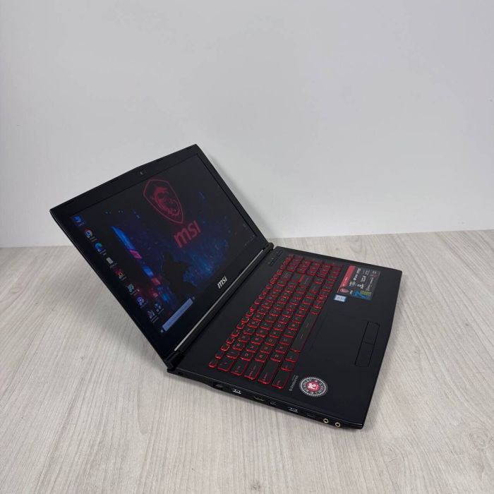Ігровий ноутбук Б-класу MSI GL62M 7REX / 15,6" (1920x1080) TN / Intel Core i7-7700HQ (4 (8) ядра по 2,8 - 3,8 ГГц) / 16 ГБ DDR4 / 128 ГБ SSD NVMe + 1000 ГБ HDD / nVidia GeForce GTX 1050 Ti, 4 ГБ GDDR5, 128-біт / Веб-камера б/в - зображення 4