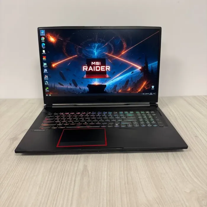Ігровий ноутбук MSI GE75 Raider 10SFS / 17.3" (1920x1080) IPS / Intel Core i7-10750H (6 (12) ядер по 2.6 - 5.0 GHz) / 16 GB DDR4 / 128 GB SSD NVMe + 1000 GB HDD / nVidia GeForce RTX 2060, 6 GB GDDR6, 192-bit / WebCam б/в - зображення 2