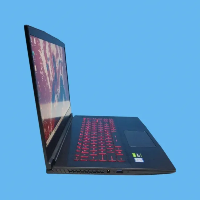 Ігровий ноутбук Б-клас MSI GF63 Thin 9SCXR / 15.6" (1920x1080) IPS / Intel Core i5-9300H (4 (8) ядра по 2.4 - 4.1 GHz) / 16 GB DDR4 / 512 GB SSD / nVidia GeForce GTX 1650 Max-Q, 4 GB GDDR6, 128-bit / WebCam / Win 10 Home б/в - зображення 4