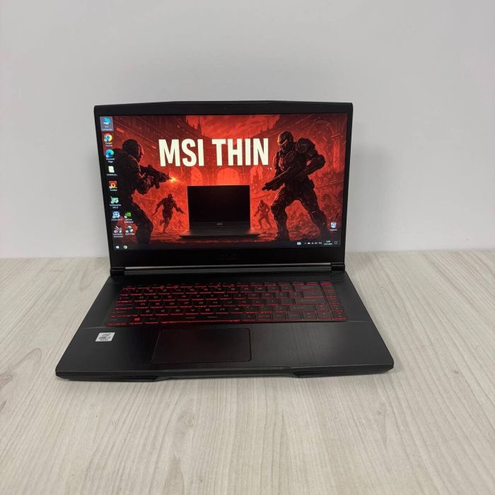 Ігровий ноутбук Б-клас MSI GF65 Thin 10SER / 15.6" (1920x1080) IPS / Intel Core i7-10750H (6 (12) ядер по 2.6 - 5.0 GHz) / 16 GB DDR4 / 512 GB SSD NVMe / nVidia GeForce RTX 2060, 6 GB GDDR6, 192-bit / WebCam б/в - зображення 2