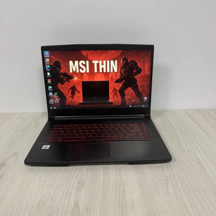 Ігровий ноутбук Б-клас MSI GF65 Thin 10SER / 15.6" (1920x1080) IPS / Intel Core i7-10750H (6 (12) ядер по 2.6 - 5.0 GHz) / 16 GB DDR4 / 512 GB SSD NVMe / nVidia GeForce RTX 2060, 6 GB GDDR6, 192-bit / WebCam б/в - зображення 2