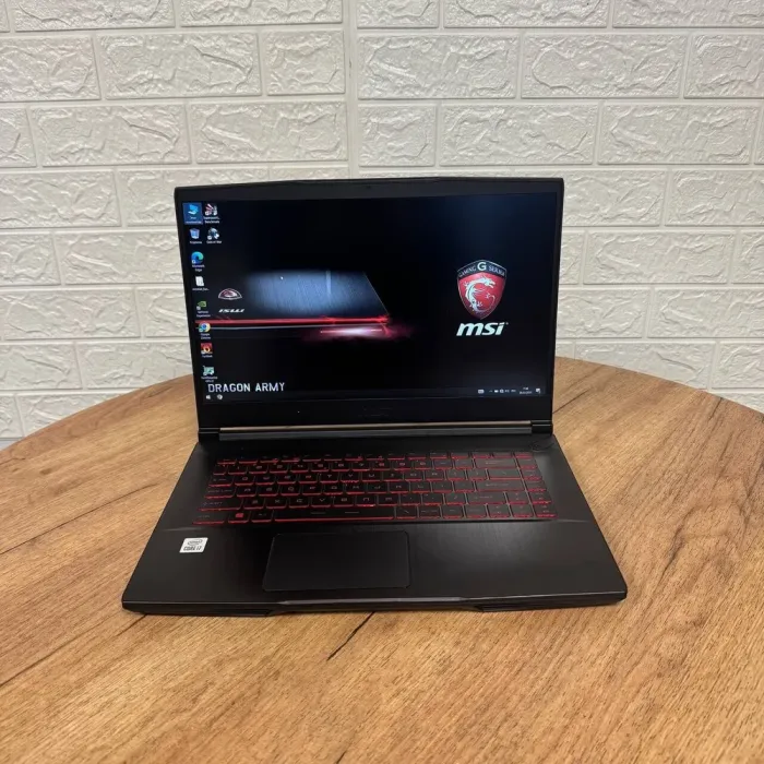 Ігровий ноутбук Б-клас MSI GF65 Thin 10UE / 15.6" (1920x1080) IPS / Intel Core i7-10750H (6 (12) ядер по 2.6 - 5.0 GHz) / 16 GB DDR4 / 512 GB SSD / nVidia GeForce RTX 3060, 6 GB GDDR6, 192-bit / WebCam б/в - зображення 2