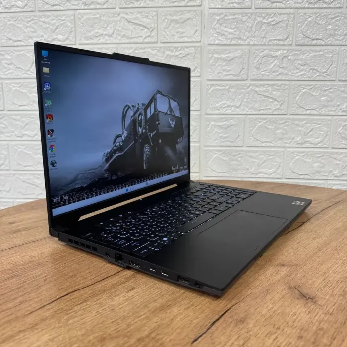 Ігровий ноутбук Asus TUF Gaming Advantage A16 FA617NS / 16" (2560x1600) IPS / AMD Ryzen 7 7735HS (8 (16) ядер по 3.2 - 4.75 GHz) / 16 GB DDR5 / 512 GB SSD / AMD Radeon RX 7600S, 8 GB GDDR6, 128-bit / WebCam б/в - зображення 4